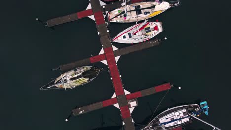 Drone-shot-of-a-marina-in-the-early-morning-near-Seattle-looking-down-on-the-boats
