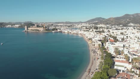 Aerial-4k-drone-footage-flying-over-the-coastline-of-the-city-of-Bodrum,-Turkey