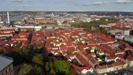 Push-in-aerial-over-the-red-roof-city-of-Gothenburg-Sweden