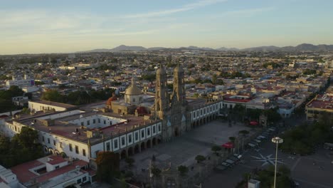 Drone-Flies-Towards-Our-Lady-of-Zapopan-Basilica-in-Guadalajara,-Mexico