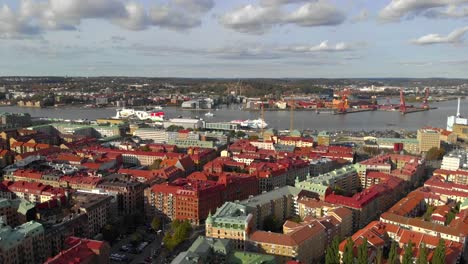 Aerial-view-of-large-inland-river-port-in-urban-area-with-many-buildings