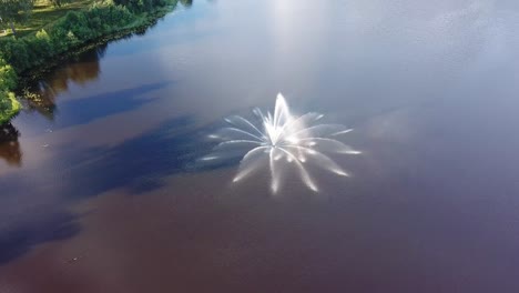 Bird's-Eye-View-Of-Fountain-In-Lake-Teperis,-Smiltene-Town-In-Latvia