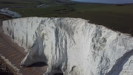 Aerial:-tall-white-chalk-cliffs,-Seven-Sisters-East-Sussex,-England