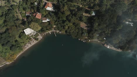 Drone-aerial,-birdseye-top-perspective-view-of-beautiful-lake-Atitlan,-Guatemala