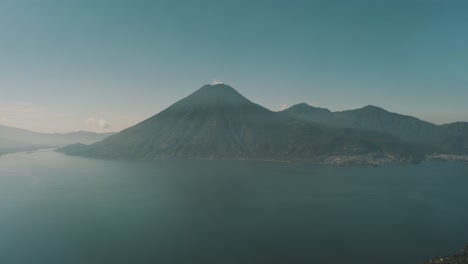 Drone-aerial-view-of-lake-Atitlan,-Beautiful-San-pedro-volcano-panoramic,-Guatemala