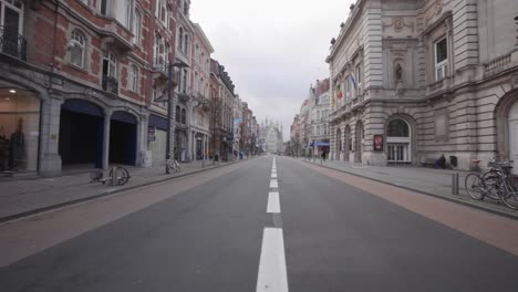 Empty-shopping-street-Bondgenotenlaan-in-Leuven,-Belgium