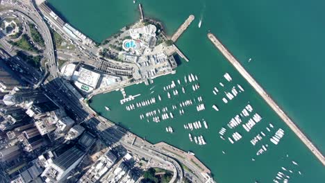 Aerial-view-of-Hong-Kong-waterfront-skyscrapers-and-coastline