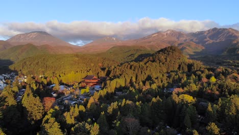Aerial-drone-over-Toshogu-shrine-and-mountains-in-Nikko,-Japan
