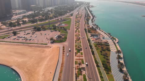 Aerial-tilt-up-revealshot-of-the-skyline-of-Abu-Dhabi