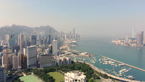 Distrito-Exclusivo-De-Wan-Chai-De-Hong-Kong-Y-Rascacielos-Del-Puerto-De-Victoria,-Vista-Aérea