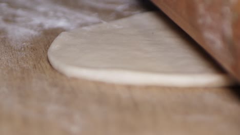Roll-the-dough-with-a-dough-roll