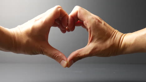 Hand-heart-symbol,-heart-form,-heart-shaped-by-hands,-heart-shape,-gesture,-hands,-fingers,-human-body,-love,-valentine,-valentine's-day