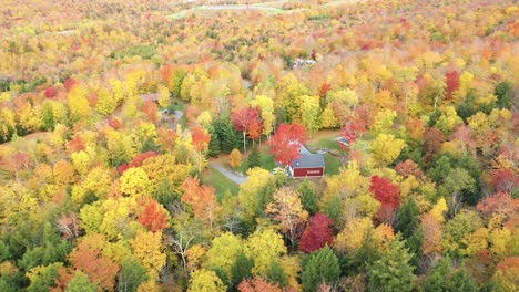 Drone-Aerial-View-of-Hidden-Ranch-in-Colorful-Autumn-Landscape-of-Vermont-USA
