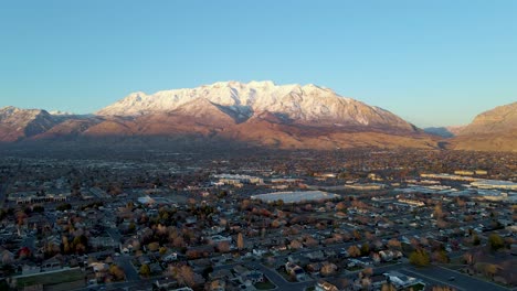 Mt-Timpanogos-backdrop-over-Salt-Lake-City,-Utah,-aerial