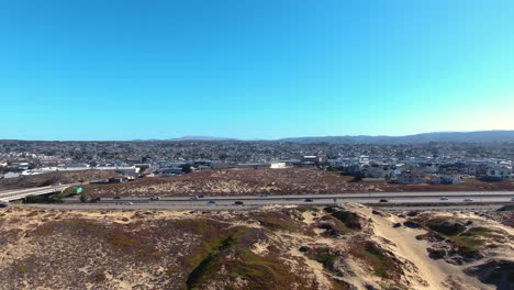 Aerial-Drone-view-of-Sand-City-Monterey-California-on-Highway-1-shot-in-4k-high-resolution