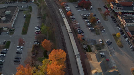 Overhead-view-of-a-passenger-train-parked-at-a-station-in-Kirkwood-in-St