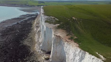 Beautiful-Seven-Sisters-white-chalk-cliffs,-East-Sussex,-England,-aerial-view