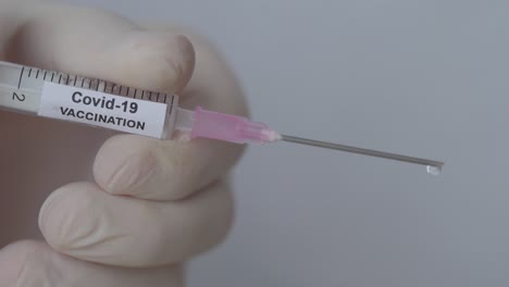Syringe-In-Medical-Set-Up-With-Corona-Virus-Vaccine,-Close-Up-Shot