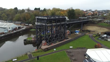 Industrial-Victorian-Anderton-canal-boat-lift-Aerial-view-River-Weaver-lowering-push-in-slow