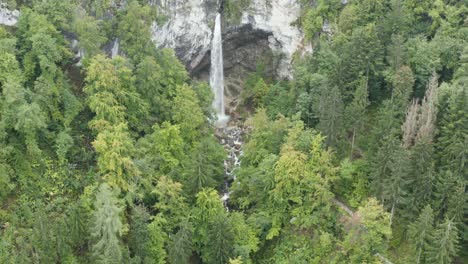 Slow-approach-of-Wildenstein-Waterfall-in-the-southern-Austrian-Alps-forest,-Aerial-dolly-in-shot