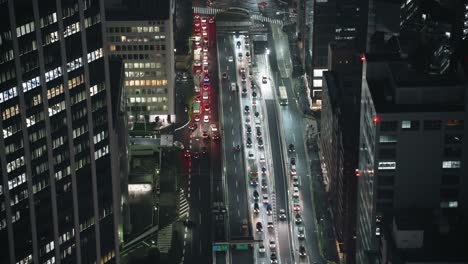 Shibuya-Roads-At-Night---Heavy-Traffic-During-Rush-Hour---high-angle,-real-time