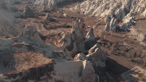 Rocks-formation-in-Cappadocia,-Turkey.-Aerial-tilt-up