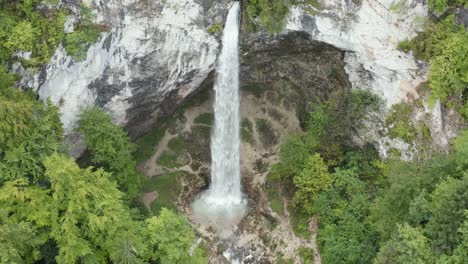Approaching-of-Wildenstein-Waterfall-in-the-southern-Austrian-Alps-looking-towards-base,-Aerial-dolly-in-shot