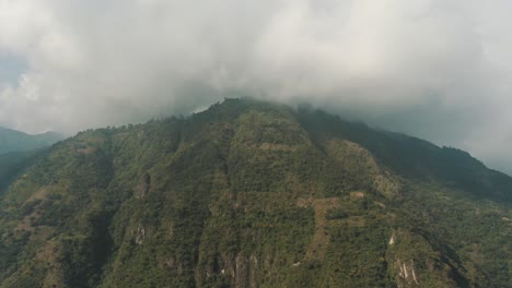 Drone-aerial-view,-cloudy-green-mountain,-nature-in-Guatemala