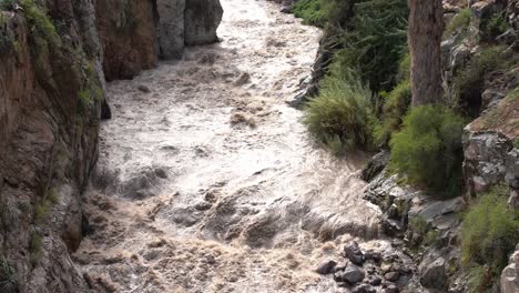 Wild-Raging-river-in-a-canyon-in-slow-motion,-colca-canyon-Peru