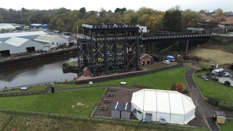 Industrial-Victorian-Anderton-canal-boat-lift-Aerial-left-close-orbit-view-River-Weaver
