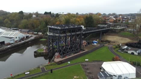 Industrial-Victorian-Anderton-canal-boat-lift-Aerial-view-River-Weaver-landmark-pan-right