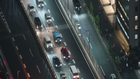 Traffic-Jam-On-A-Highway-In-Shibuya,-Tokyo-At-Nighttime---high-angle,-real-time