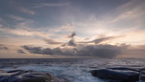 Rocky-seacoast-of-Norway-at-winter-sunset,-time-lapse-video