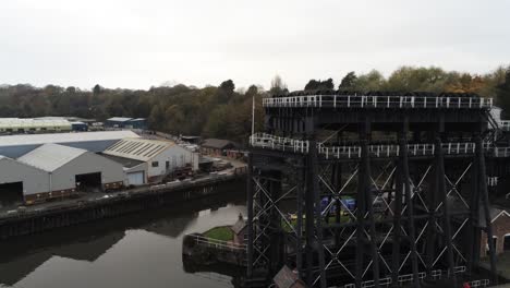 Industrial-Victorian-Anderton-canal-boat-lift-Aerial-view-River-Weaver-pan-right