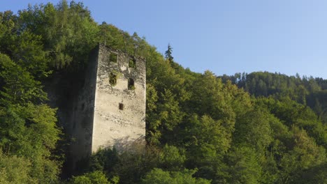 Puchenstein-Castle-Tower-Ruin-Nestled-In-Forest-Hills-In-Dravograd,-Slovenia