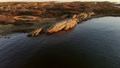 Drone-footage-of-seacoast-in-Southern-Norway-at-golden-hour