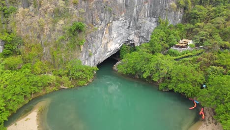 Drone-shot-moving-backward-from-Phong-Nha-cave