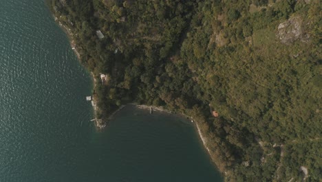 Drone-aerial-top-view-of-beautiful-lake-Atitlan-and-green-forest-in-Guatemala