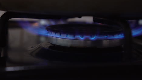 Switching-on-a-gas-burner-with-blue-flames