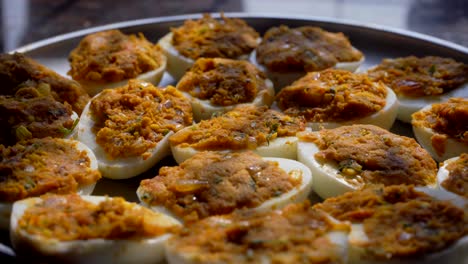 filling-eggs-stuffing-boiled-egg-plate-full-of-looking-tasty-closeup-Deviled-egg-also-known-as-stuffed-eggs,-Russian-eggs,-or-dressed-eggs