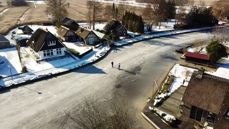 Ice-skating-in-National-Park-"de-Weerribben",-Overijssel,-The-Netherlands