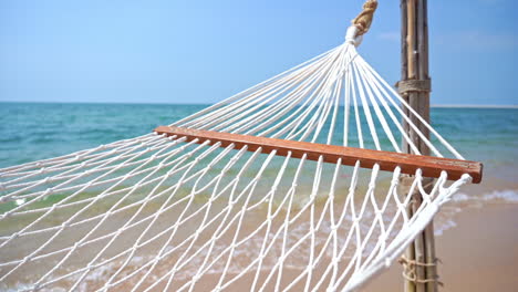 Empty-hammock-with-sea-in-background
