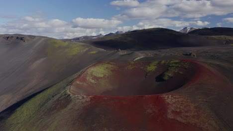 Red-Volcanic-Soil-In-Crater-Of-Raudaskal-At-Daytime-In-Southern-Iceland