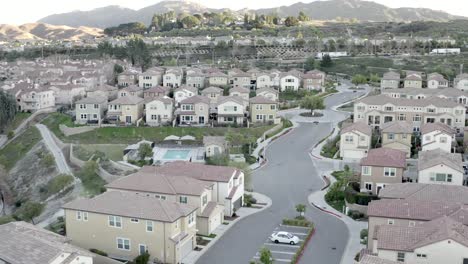 Aerial-footage-over-Santa-Clarita-residential-city-suburb,-California-America