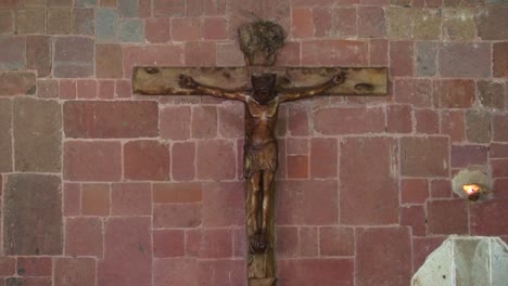 Jesus-crucified-on-the-cross,-inside-Notre-Dame-Cathedral-in-Taiohae,-Nuku-Hiva,-French-Polynesia