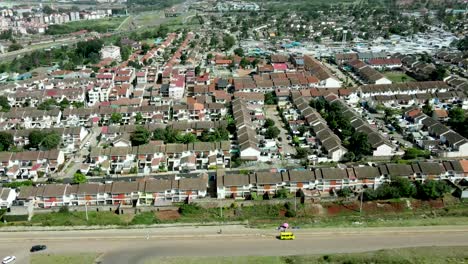 Aerial-slider-shot-of-large-residential-neighborhood-of-Nairobi-City-in-Africa