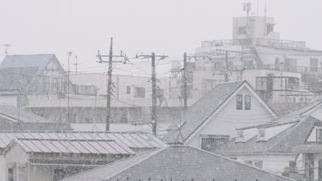 Scenery-Of-Roofs-On-Township-During-Snowstorm-In-Tokyo,-Japan