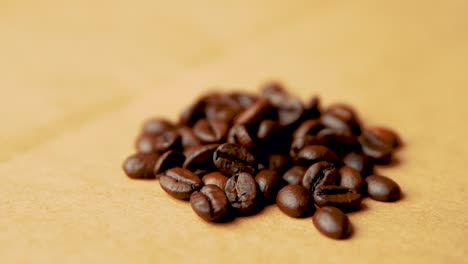 Pile-of-coffee-beans-rotates-in-a-circle-slow-motion-vintage-look