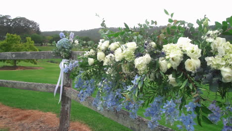 Beautiful-White-Roses-Arrangement-Ornate-During-Outdoor-Nature-Wedding