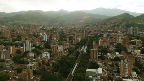 Beautiful-Drone-View-of-Metro-Train-in-Picturesque-Colombian-City-of-Medellin